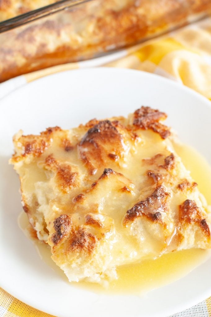 Amaretto Bread Pudding on a plate with sauce