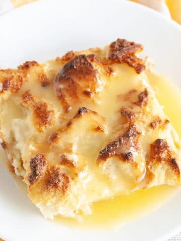 bread pudding with sauce on a plate