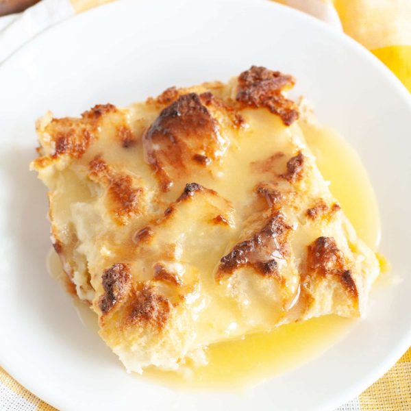 bread pudding with sauce on a plate