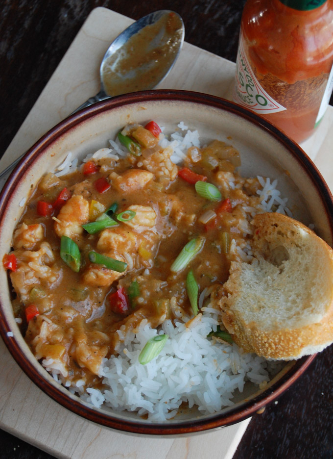 Shrimp Etoufee in a bowl with rice and bread