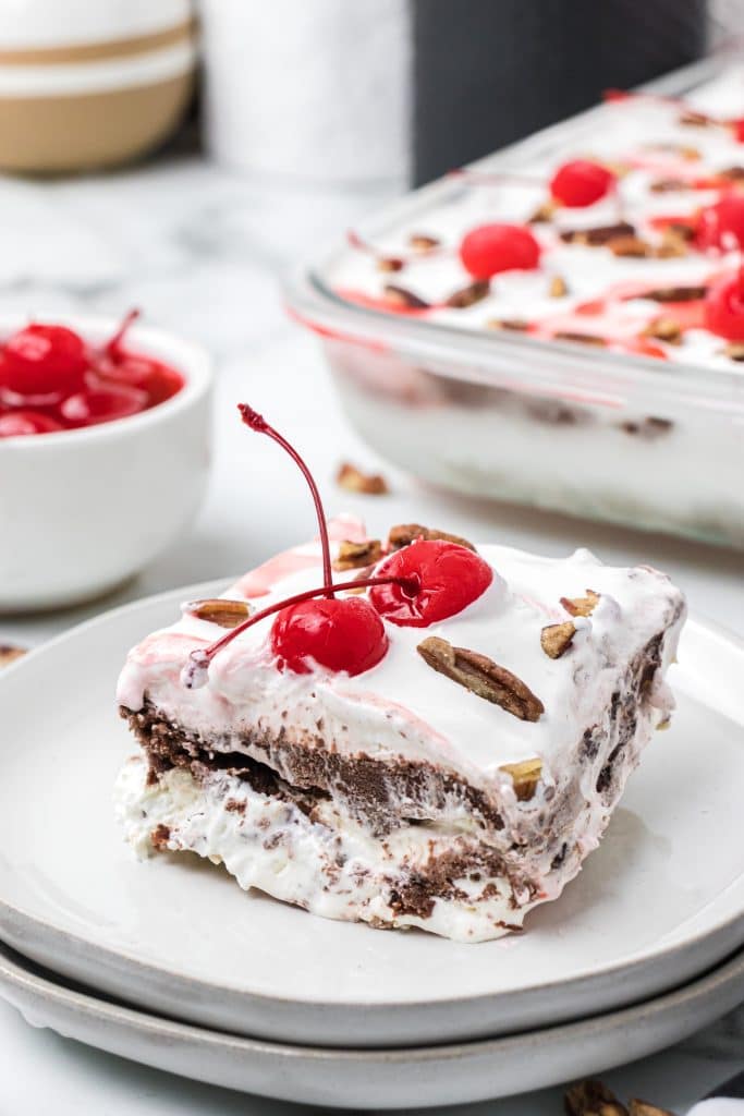 Plate with pudding dessert and cherries.