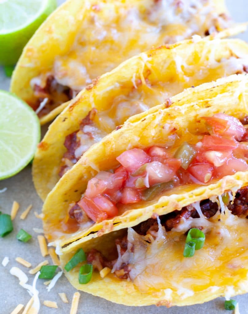 Tacos with salsa, and cheese