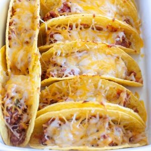 Beef tacos in casserole dish.