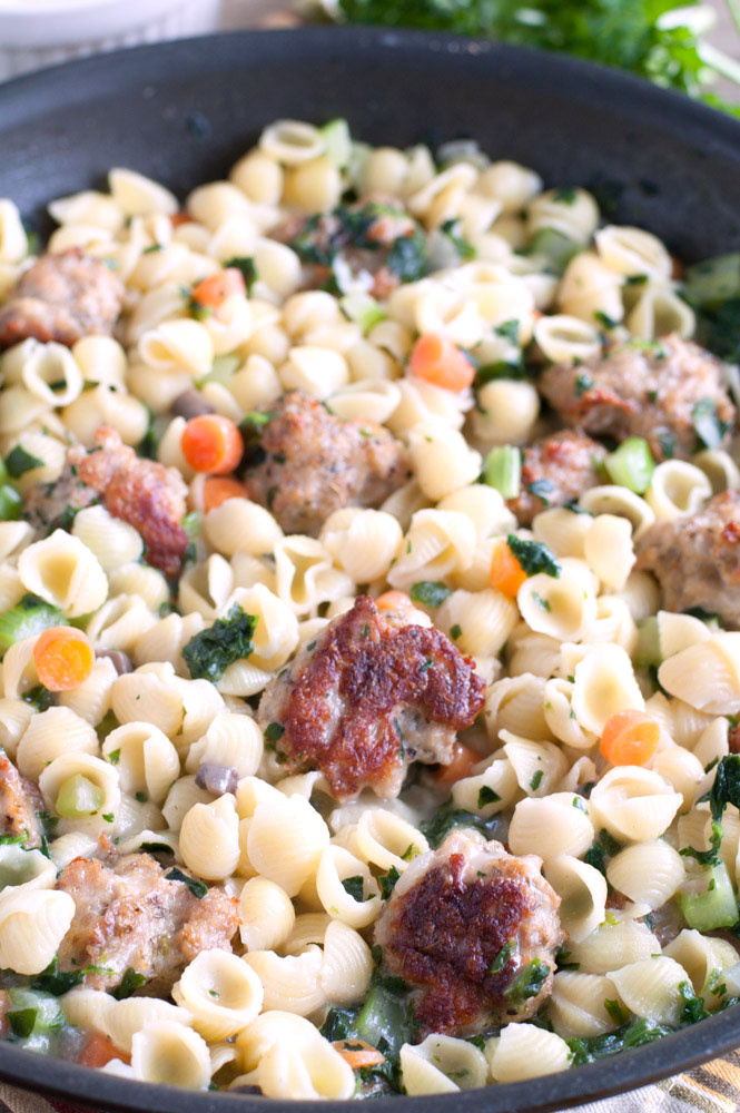 Close-up View of Mini-Shell Pasta, Meatballs and Vegetables in a Pan