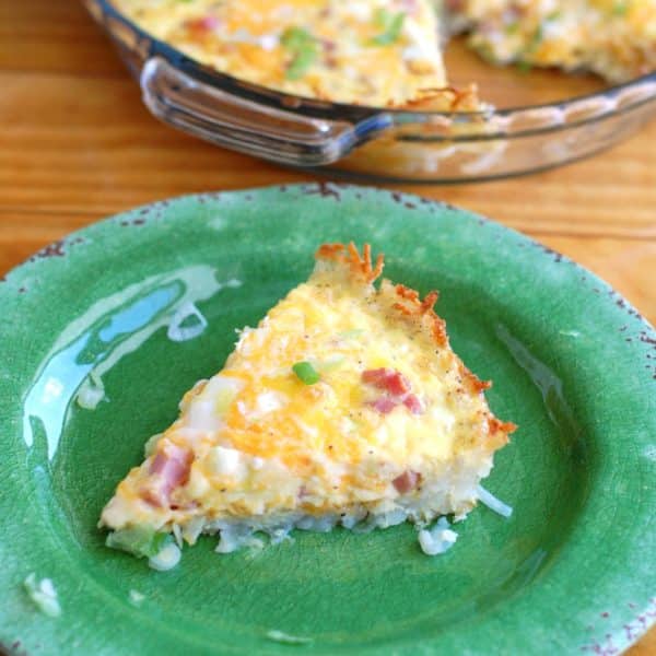 Piece of breakfast casserole on plate.