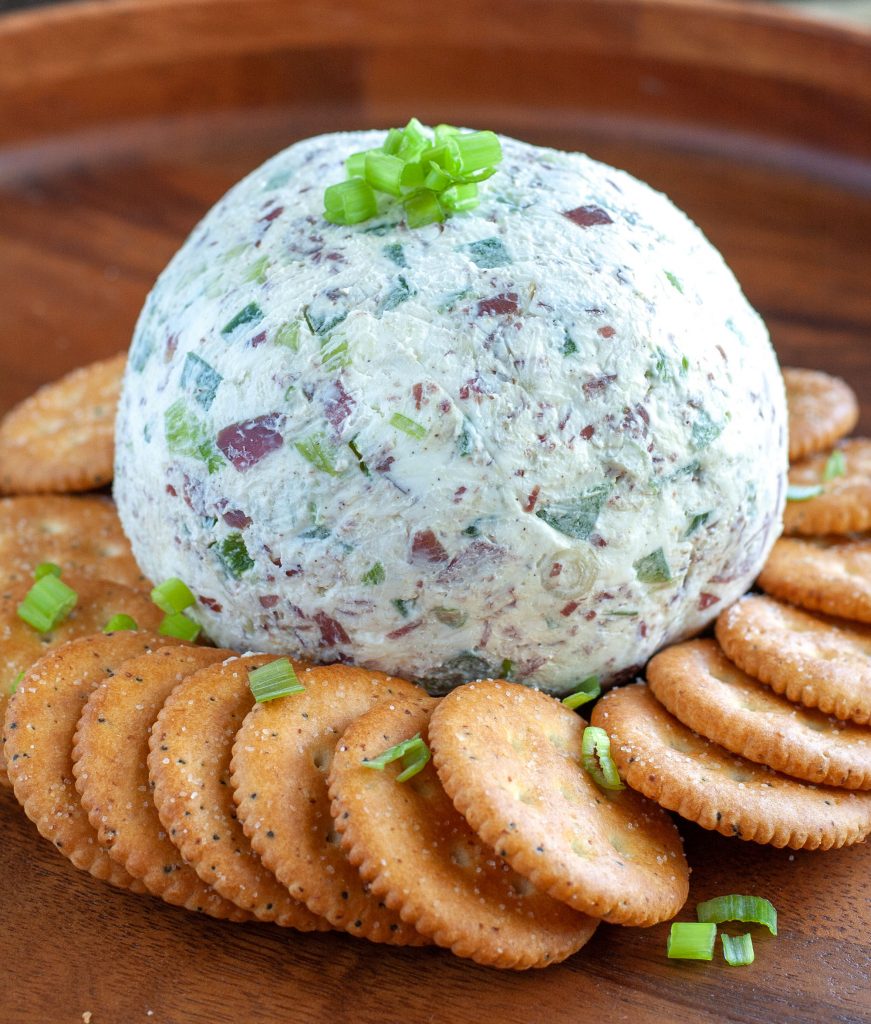 Chipped Beef Cheese Ball Chipped Beef Cheese ball with crackers on a tray