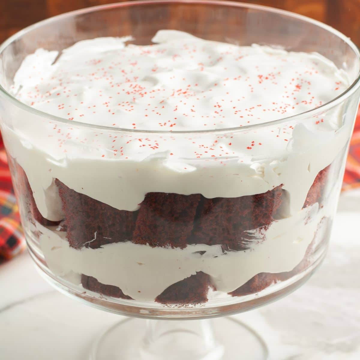 Bowl with red velvet cake trifle. 