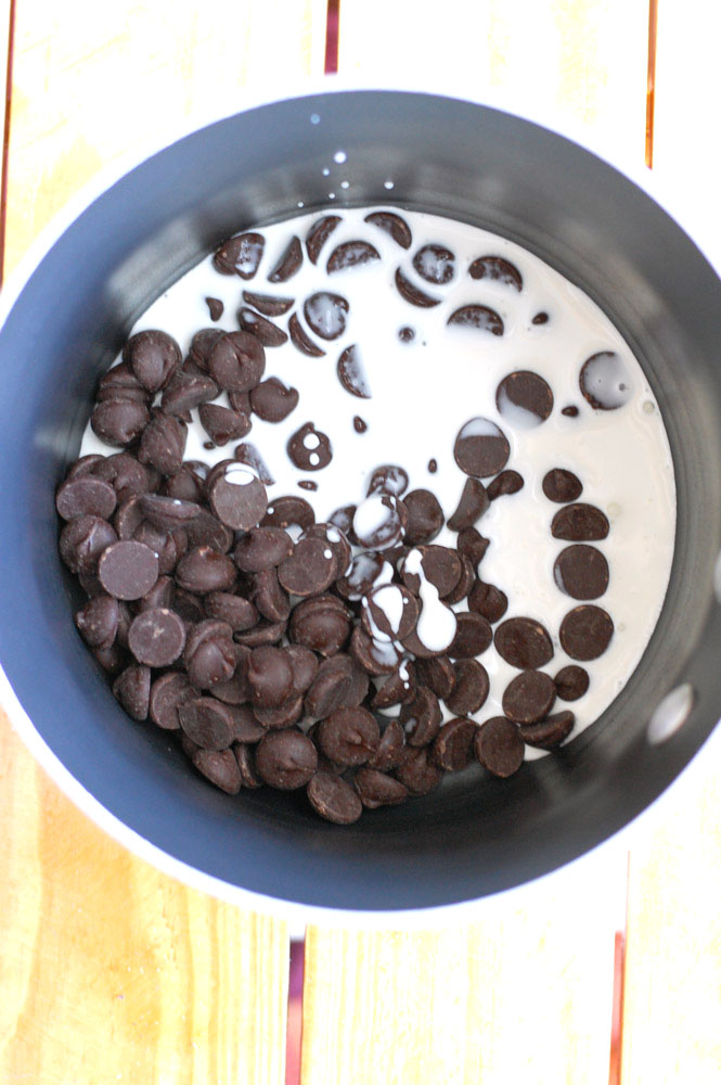 chocolate chips and cream in a saucepan