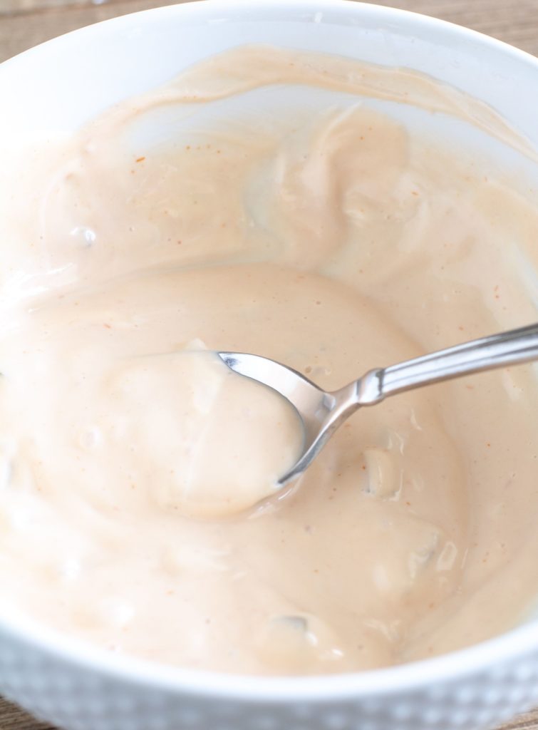 White Bowl with Homemade Thousand Island Dressing and a spoon
