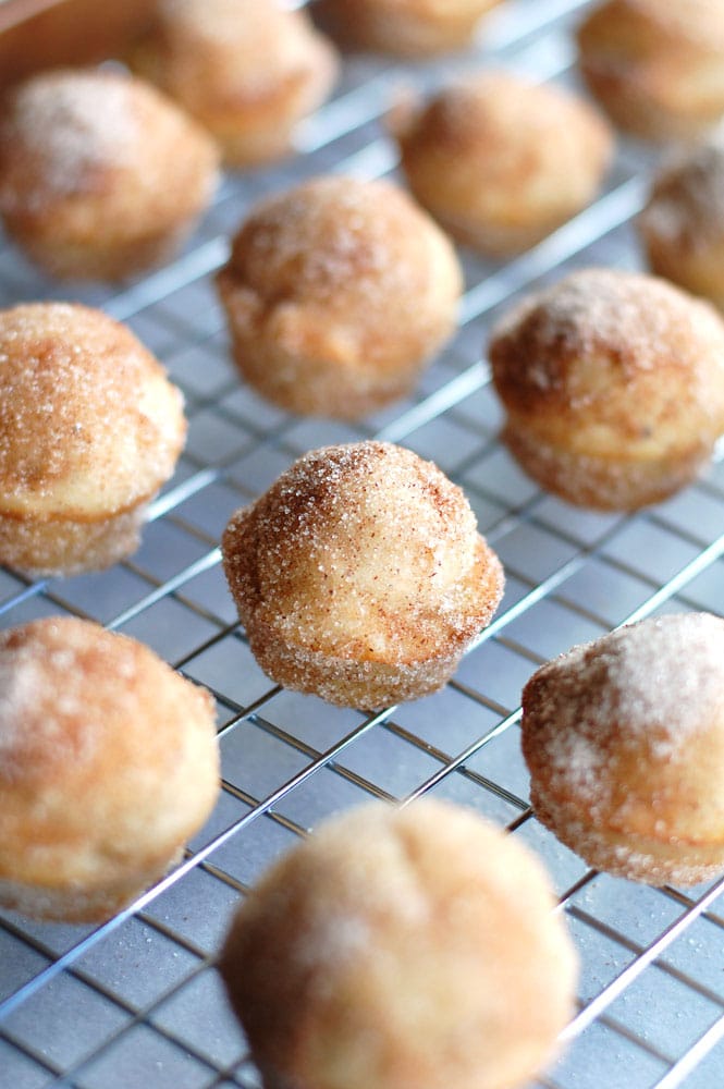 Cinnamon Sugar Banana Donut Holes banana donut holes on a wire cooling rack