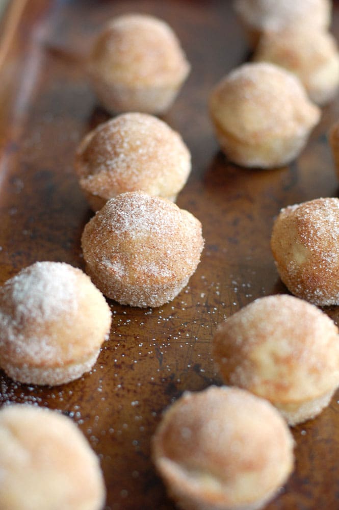 Cinnamon Sugar Donut Holes donut holes on a pan