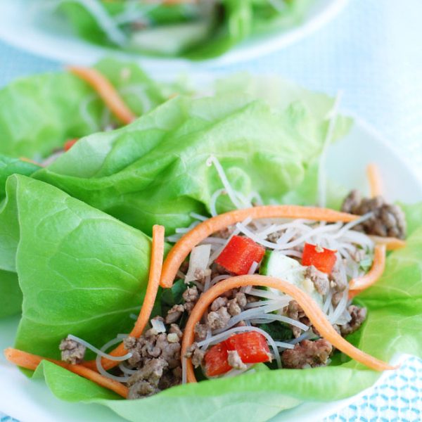 Plate with lettuce leaf and ground beef mixture.