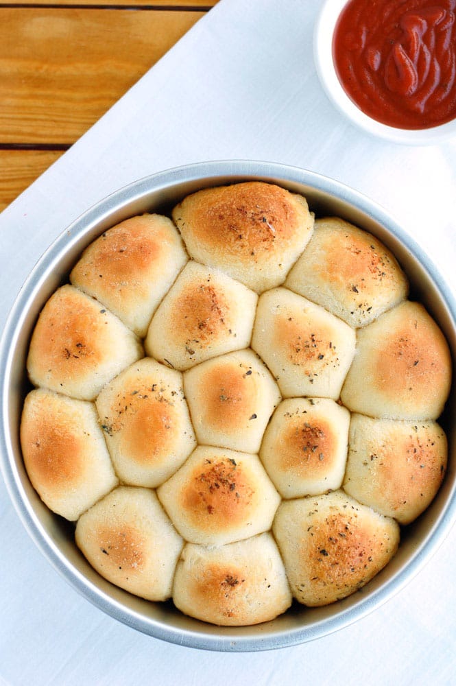 Meatball biscuit bombs make the perfect meal or snack. Cheese and meatballs rolled up in a biscuit, they are like little meatball subs.