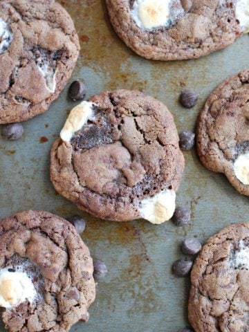 Chocolate and marshmallow cookies on a pan.