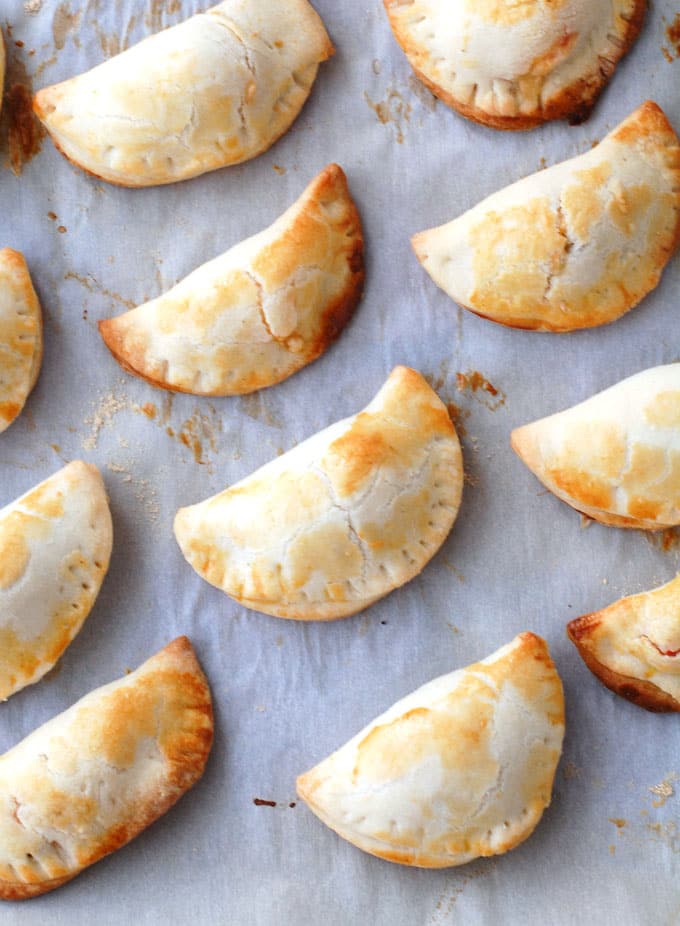 Empanadas on a baking sheet