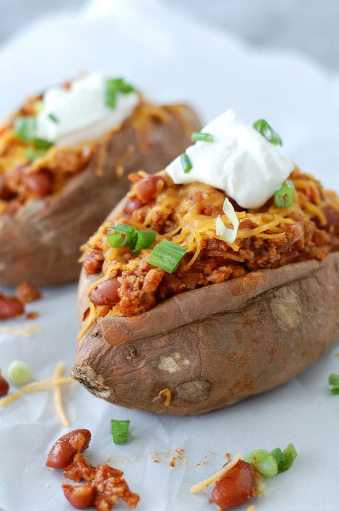 Turkey Chili Sweet Potatoes Baked sweet potato stuffed with chili.