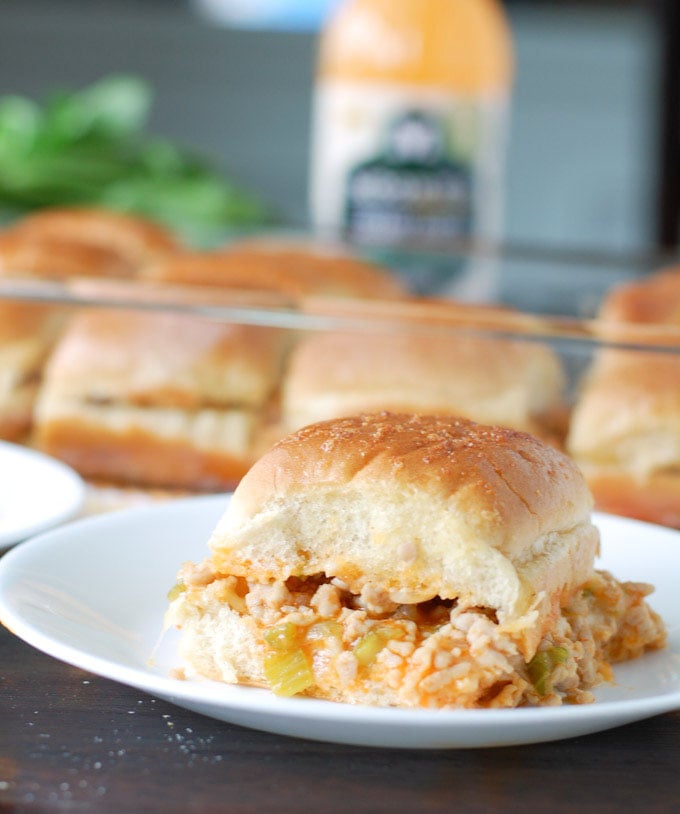 Buffalo Ranch Chicken Sliders are made with ground chicken, celery, onion and creamy ranch buffalo wing sauce.The perfect tailgating or party food.