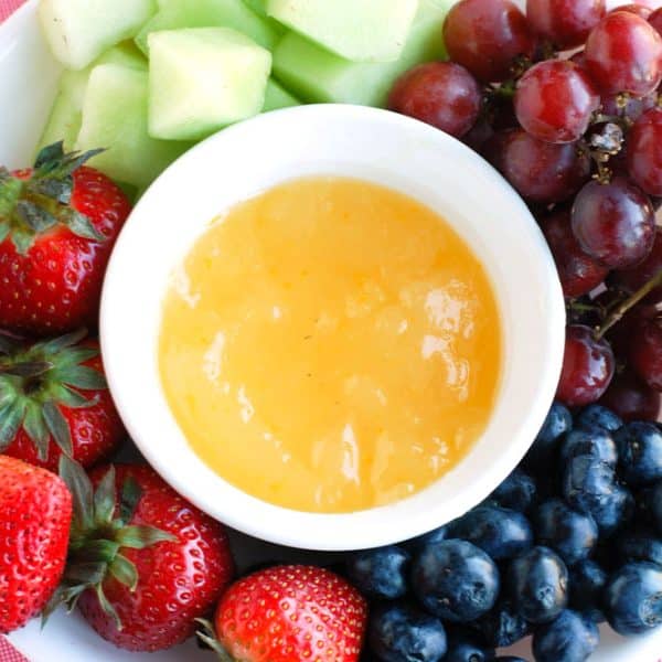 Fruit platter with orange dip.