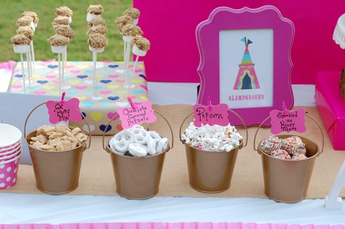 This Glamping party has everything you need including printables, smores pops and tissue paper tassel tutorial.