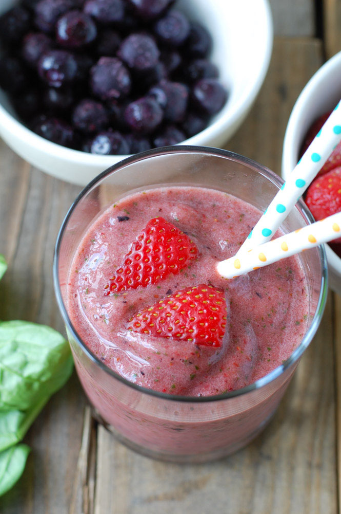 Glass of smoothie with strawberries. 