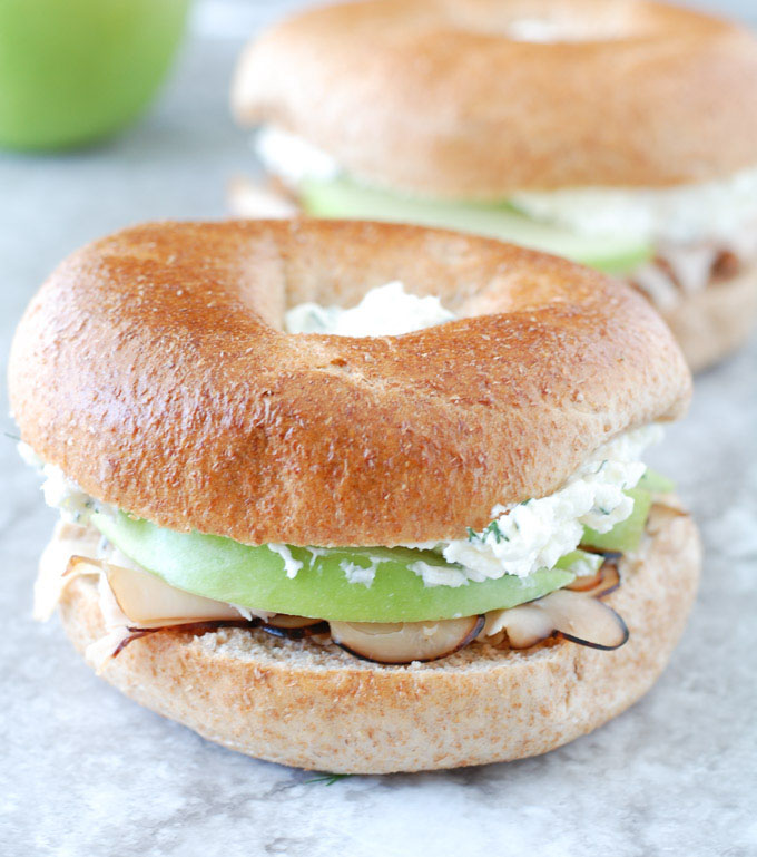 Bagel sandwich with apple and turkey. 