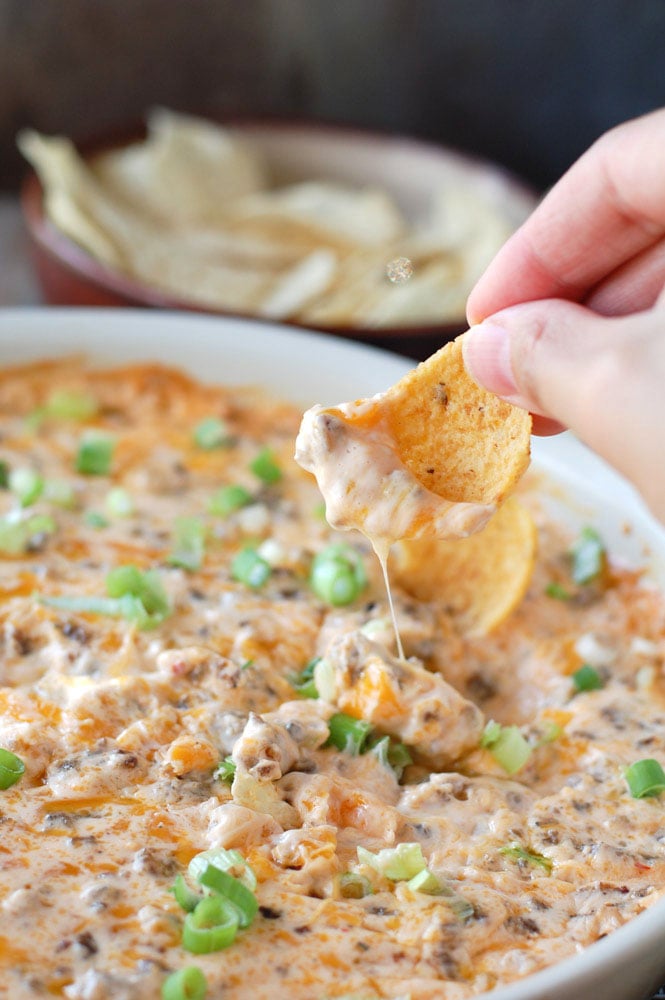 My friends and family are always asking me for suggestions on what to bring to a party. I have gathered up 15 of my favorite game changing dips for your next party that everyone will love. 