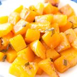 Plate with roasted butternut squash.