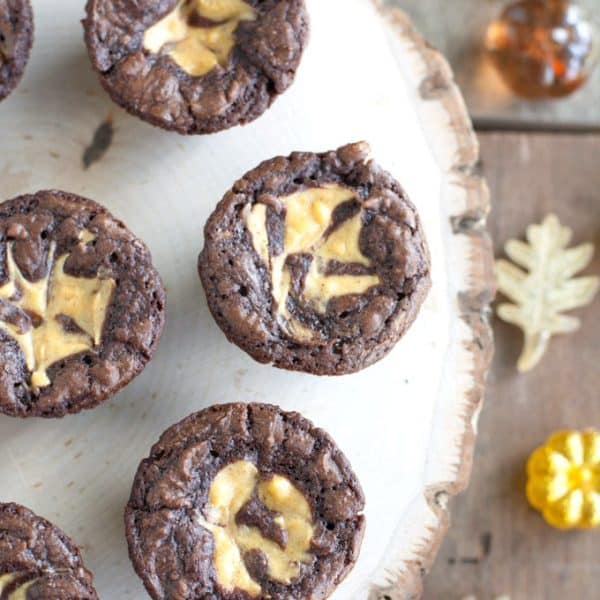 Brownie bites with swirl of cream cheese.