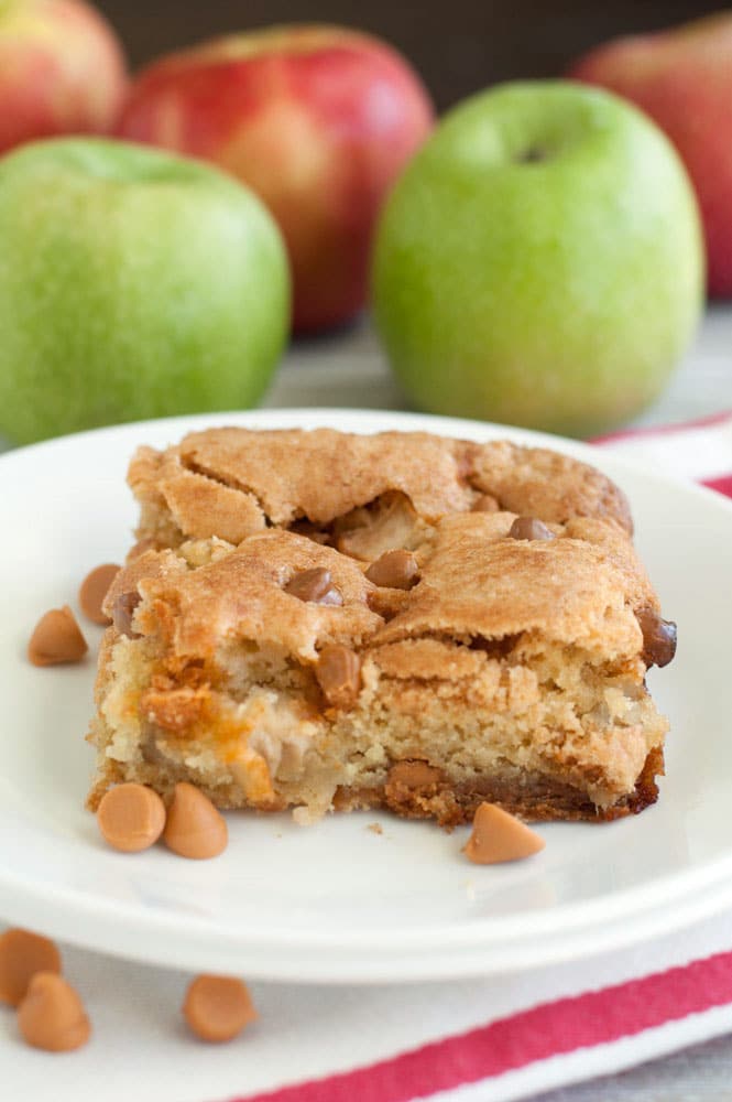 Fresh apple cake with butterscotch chips is a cross between a cake and a bar. It is filled with fresh apples, butterscotch chips and cinnamon. This cake is delicious and moist, the perfect fall treat.