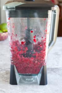 Cranberry Lime Mocktail Blender with crushed cranberries