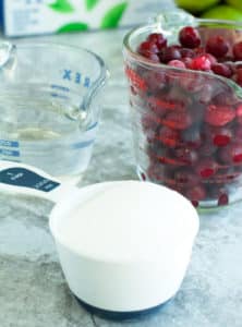 Cranberry Lime Mocktail cup of sugar, bowl of cranberries and water