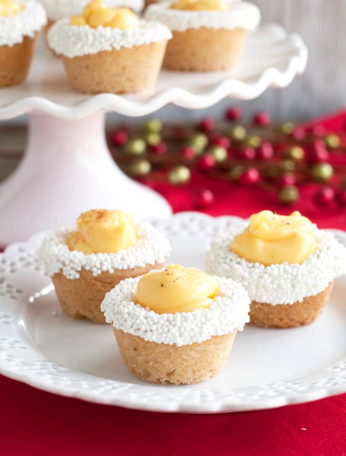 Three cookie cups on a plate. 