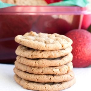 Stack of cookies with red ornament.
