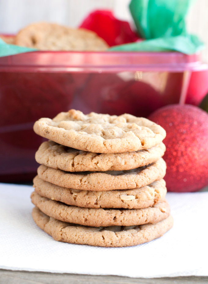Stack of cookies with red ornament. 