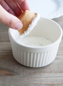 Sugar cookie dough baked in a mini muffin pan and topped with eggnog pudding make these eggnog cookie cups a delicious holiday treat.