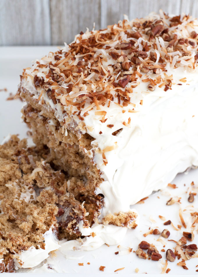 Layered coconut spice cake with cream cheese frosting is a cake sure to impress your guests. Filled with warm spices, coconut and chopped pecans, this cake has texture and amazing flavors.