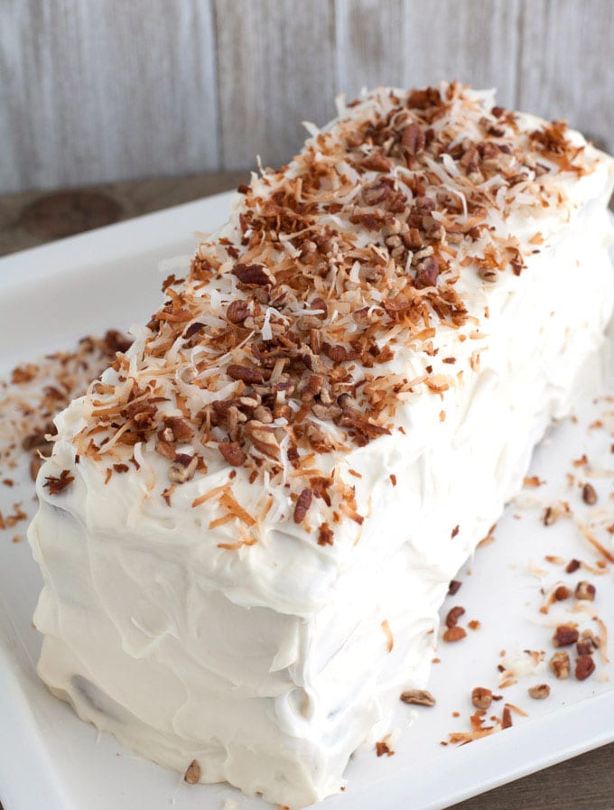 Cake with topped with toasted coconut. 