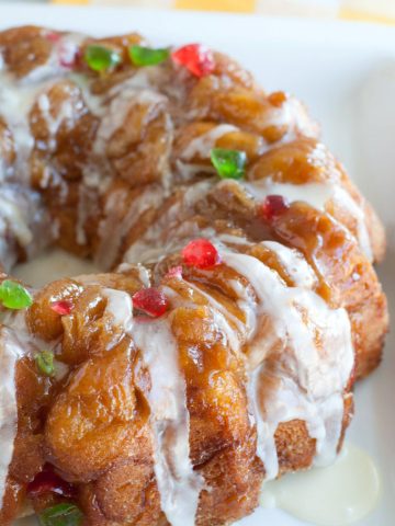 Pull apart bread with green and red cherries.