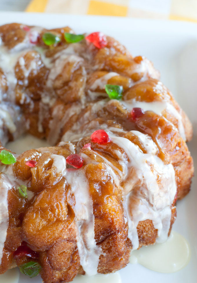 Pull apart bread with green and red cherries. 
