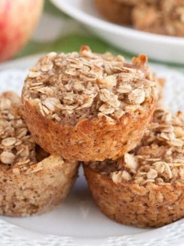 Apple Cinnamon Oatmeal Cups stacked on plate