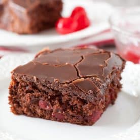 Piece of chocolate cake on a plate.