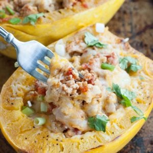 Spaghetti squash filled with ground chicken and cheese.