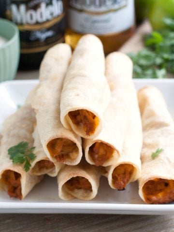 Taquitos on a plate.