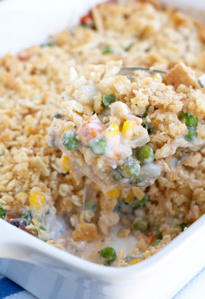 Vegetable casserole on a serving spoon. 