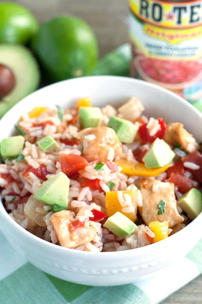 Chicken Fajita Rice Bowl - fajita seasoned chicken mixed with peppers, onions, RO*TEL and cilantro lime rice. A bold and flavorful meal the family will love.