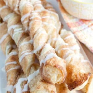 Cinnamon puff pastry twists on a plate.