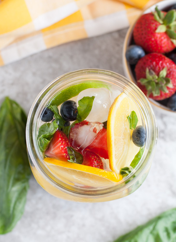 Glass filled with fruit and mint