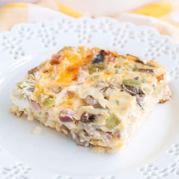 Piece of breakfast casserole on plate.