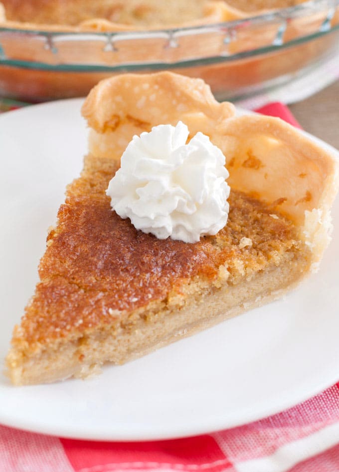 Piece of chess pie on a plate. 