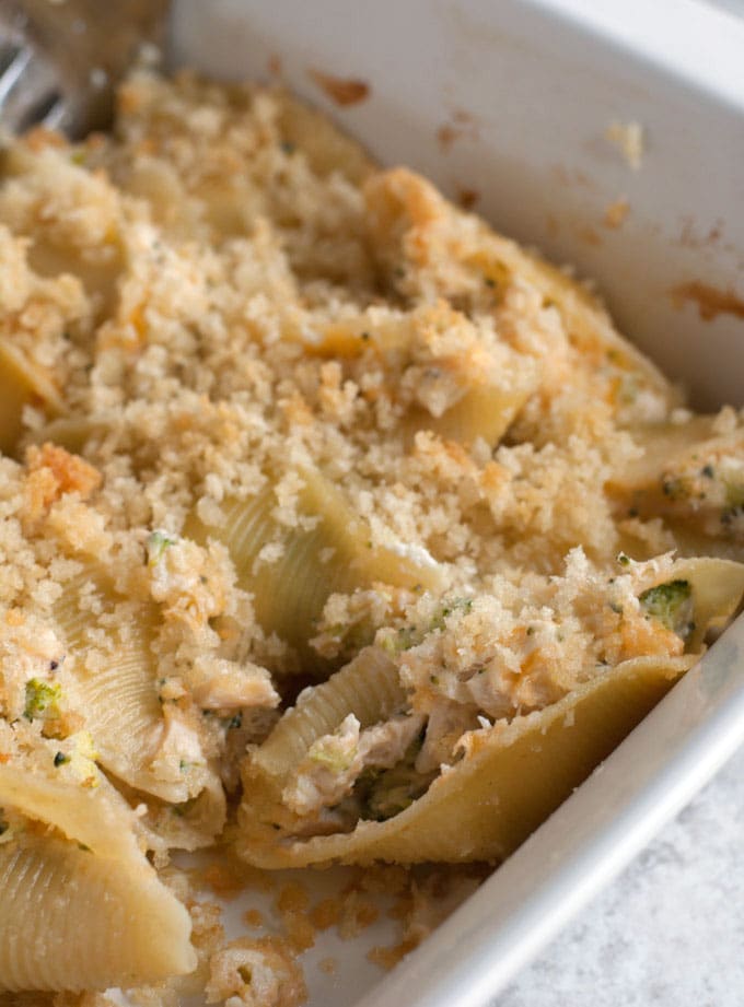 Stuffed pasta shells in baking dish. 